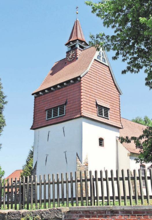 Mitten im Dorf steht die Kirche zum Guten Hirten. Mitten im Dorf steht die Kirche zum Guten Hirten.