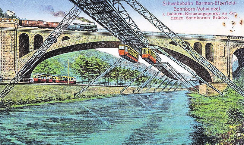 Auf dieser historischen Postkarte ist die markante Eisenbahnbrücke in Sonnborn zu sehen. Die Schwebebahnstrecke führt ebenso hindurch wie die heutige Friedrich-Ebert-Straße. Repro: Archiv Wolfgang Sauber Auf dieser historischen Postkarte ist die markante Eisenbahnbrücke in Sonnborn zu sehen. Die Schwebebahnstrecke führt ebenso hindurch wie die heutige Friedrich-Ebert-Straße. Repro: Archiv Wolfgang Sauber