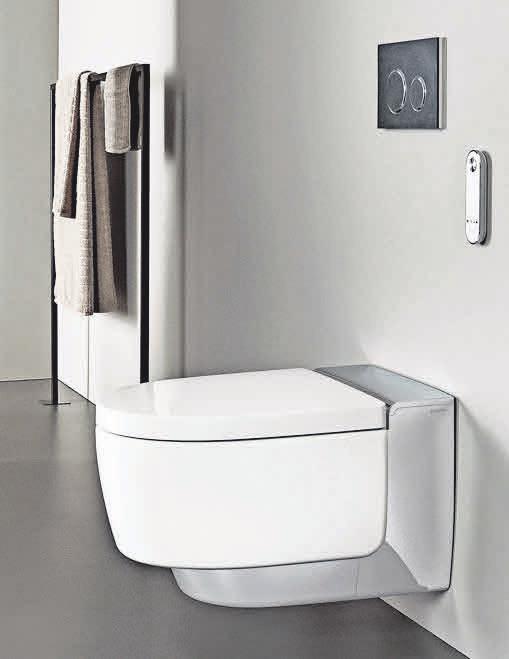 Elegant: Dusch-WC mit Designabdeckung in Chrom, Spülauslösung in Schiefer mit Designelementen in Schwarzchrom. Foto: xerra retina pro Elegant: Dusch-WC mit Designabdeckung in Chrom, Spülauslösung in Schiefer mit Designelementen in Schwarzchrom. Foto: xerra retina pro