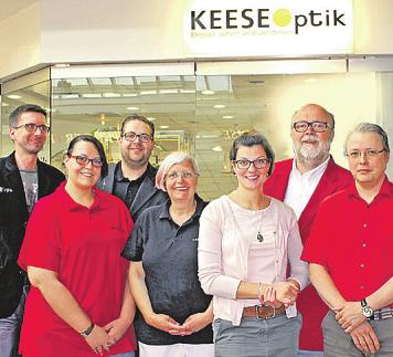 Norbert Keese und Team im Buchholzer City Center Foto: Keese