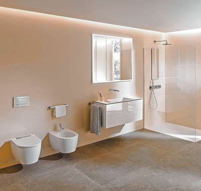 Trend im Bad: Farbige Metalle für die Armaturen und weitere Elemente wie die WC-Betätigungsplatte schaffen ein einheitliches Badambiente Foto: djd/Geberit