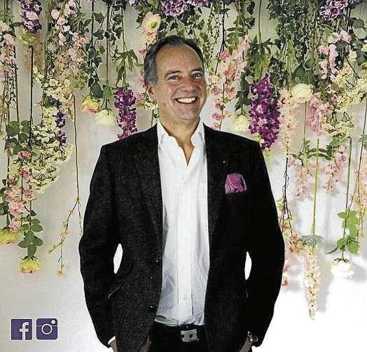Meislahn-Inhaber Daniel Hacker vor der „Flower Wall“. FOTO: MEISLAHN Meislahn-Inhaber Daniel Hacker vor der „Flower Wall“. FOTO: MEISLAHN