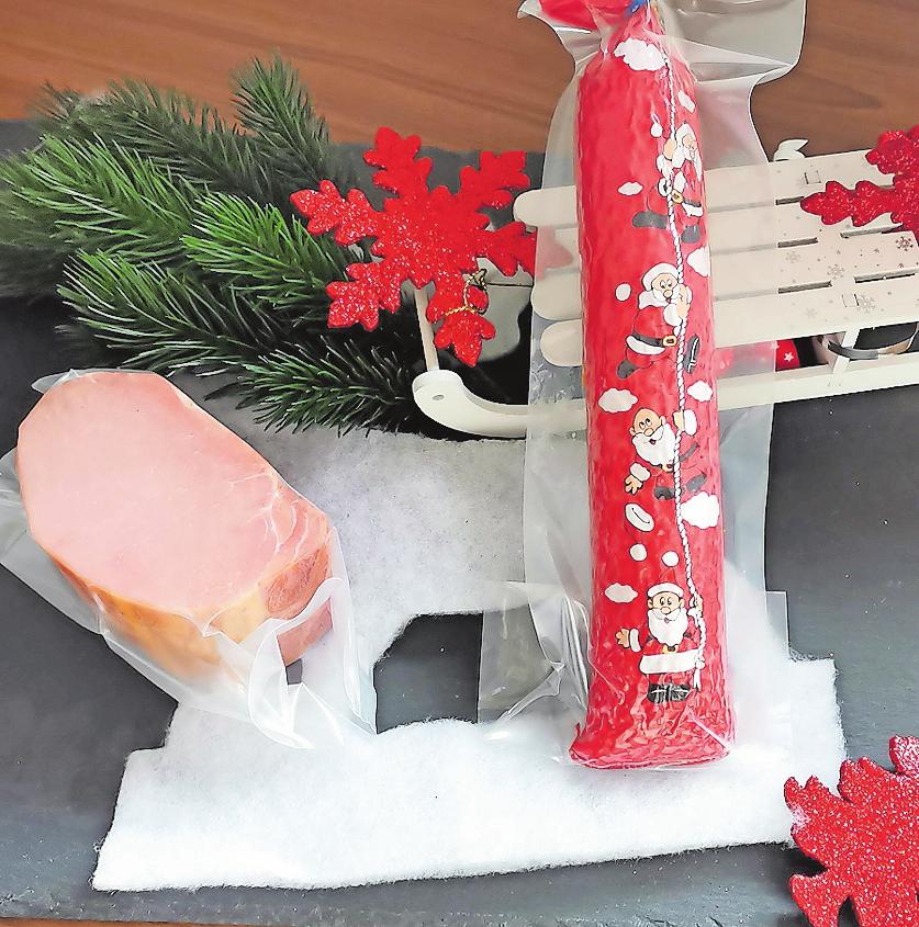 Bei den Kunden sehr beliebt als Geschenke: weihnachtliche verpackte Produkte der Metzgerei Kuhn, die sich auch für Präsenttaschen oder -körbe anbieten. FOTO:METZGEREI KUHN/FREI