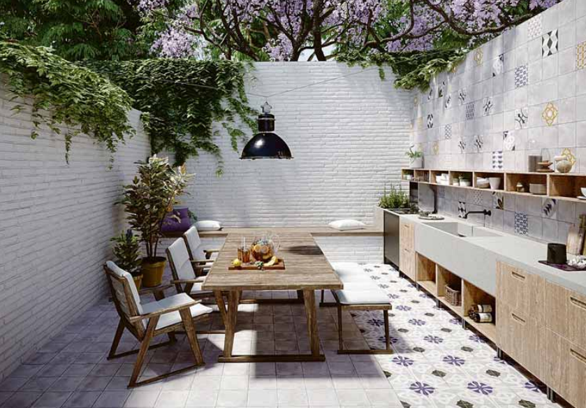 Outdoor-Küchen sind ideal für alle, die gerne und oft Gäste auf der Terrasse empfangen. Feinsteinzeugfliesen im Retro-Look sorgen nicht nur für Flair, sondern sind absolut pflegeleicht. Foto: djd/Deutsche-Fliese.de/Jasba