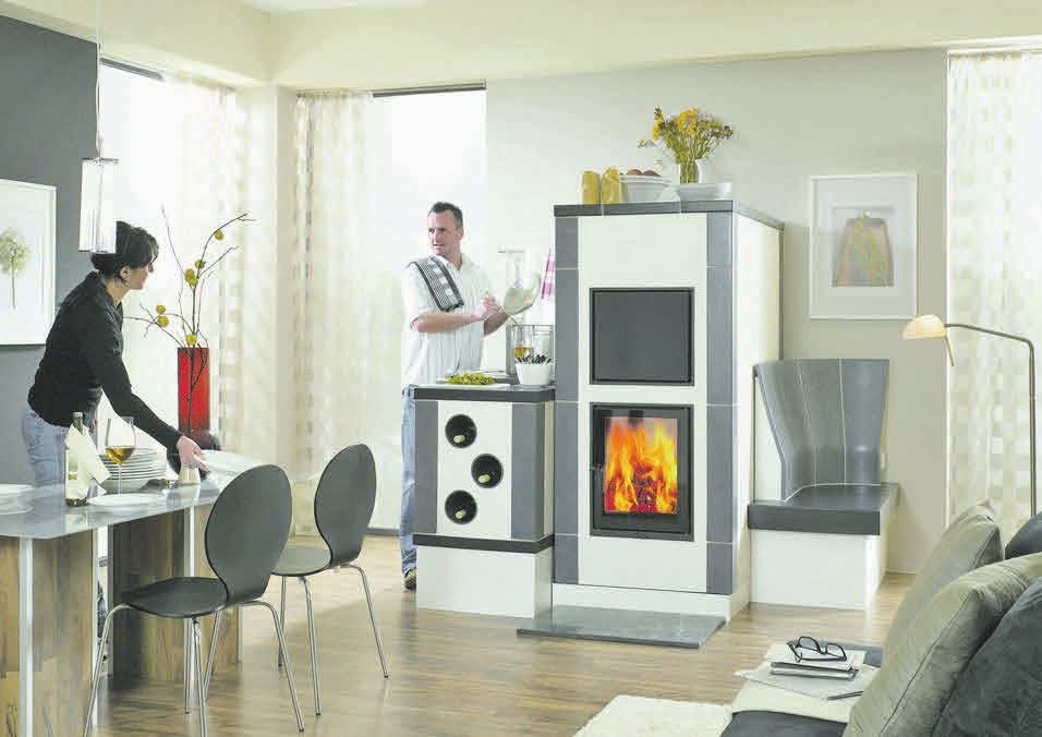 Moderne Feuerstätten lassen sich in jeden Raum und Wohnstil integrieren. Foto: AsK – Arbeitsgemeinschaft der deutschen Kachelofenwirtschaft Moderne Feuerstätten lassen sich in jeden Raum und Wohnstil integrieren. Foto: AsK – Arbeitsgemeinschaft der deutschen Kachelofenwirtschaft