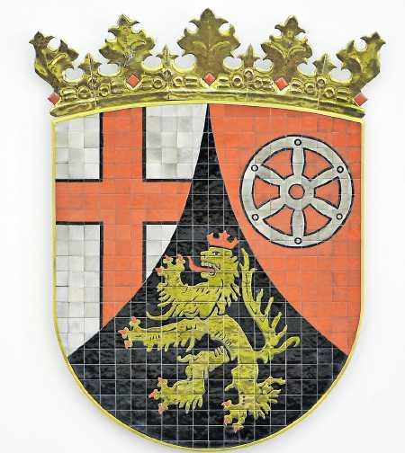 Das Wappen von Rheinland-Pfalz bewahrt die Erinnerung an die reiche Geschichte der einzelnen Landesteile: das Trierer Kreuz, das Mainzer Rad und der Pfälzer Löwe. FOTO: FREDRIK VON ERICHSEN/DPA